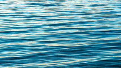 Blue water surface and small ripples