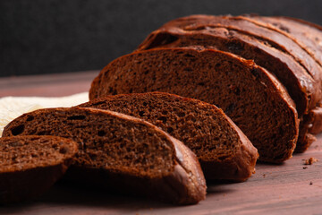 Sliced Sourdough Rye Bread, Freshly dark bread. Perfect for recipe, article, catalogue, or any commercial purposes. with copy space.