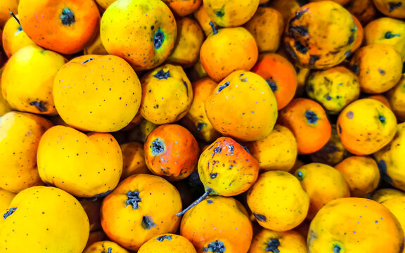Mexican local fruit tejocote texture pattern in Mexico.