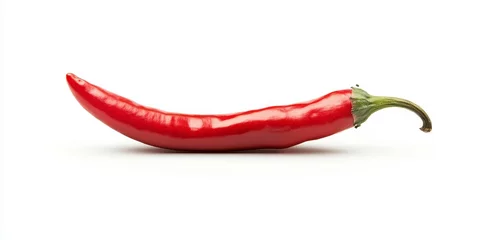 Fresh red chili pepper displayed on a white background, highlighting the vibrant color and texture of the fresh red chili pepper, perfect for culinary themes and spice related concepts.