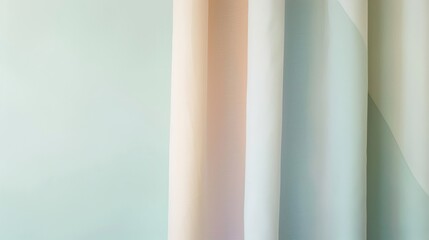 Fototapeta premium The image shows soft, flowing fabric in pastel tones of pink, green, and cream, creating a calming and elegant atmosphere with smooth, gentle gradients.