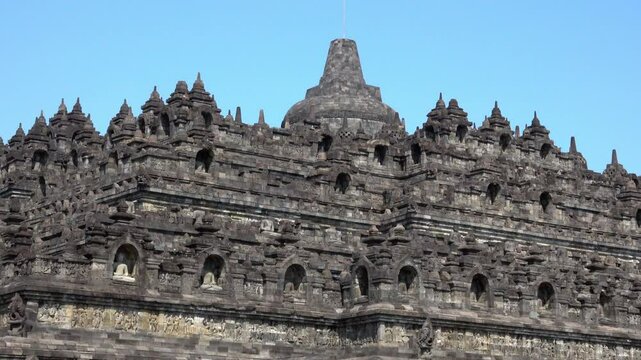 Intricate stone work of Borobudur Temple in Indonesia.