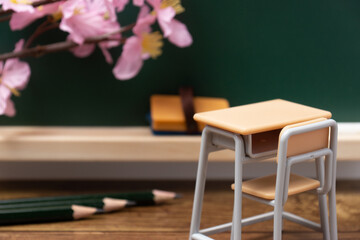 桜と教室で勉強のイメージ
