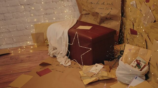 Cozy Christmas setup with parcels, fairy lights, and festive decorations
