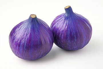 Obraz premium Two Ripe Purple Figs on White Background