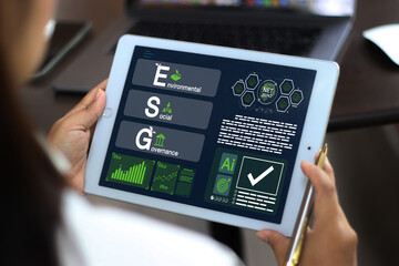 ESG analysis on screen in business investment strategy ideas. ESG Environment Social Governance Business Ideas Environmental Investment and Business Grow Together.