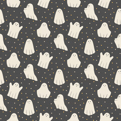 Cute flying Halloween ghosts are flying in the night sky