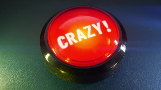 Pressing the big red button labeled with the message "Crazy"