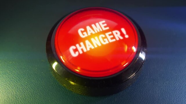 Pressing the big red button labeled with the message "Game Changer"