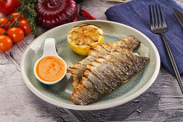 Grilled seabass fillet with lemon