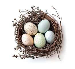 Obraz premium Colorful Easter Eggs in a Rustic Bird's Nes