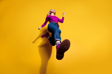 Low below angle full length body size view of nice attractive cheerful girl having fun going making...