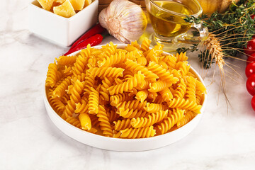 Italian dry pasta Fussili for bowl