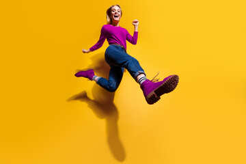 Fototapeta na wymiar Low below angle full length body size view of nice attractive cheerful girl making step wearing vintage retro maroon burgundy footwear isolated over bright vivid shine orange background