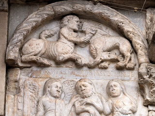 San Zeno Basilica Church in Verona Italy, detail of exterior sculptures and bas relief