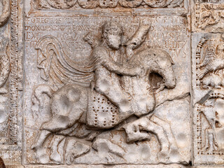 San Zeno Basilica Church in Verona Italy, detail of exterior sculptures and bas relief