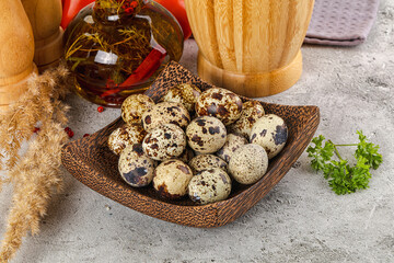 Raw quail egg in the bowl