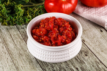 Diced ripe tomato with sauce