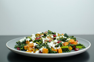 Butternut squash, Kale, Pomegranate seeds, Feta cheese  and Pumpkin seeds salad with Mustard Vinaigrette
