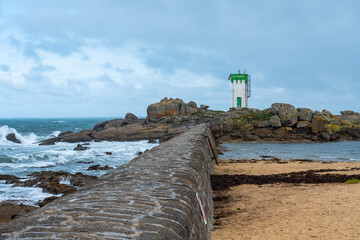 Trévignon lighthouse on rocky Brittany coast with stormy waves