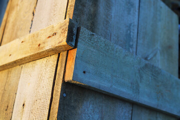 Wooden plank background - light and dark side.