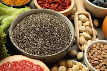 Superfood. Different healthy food products on grey table, closeup