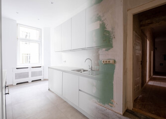 New kitchen before and after renovation - Home Improvement concept -