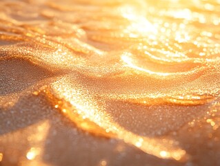 Close up of waves on the beach and a beautiful sunrise over the sea