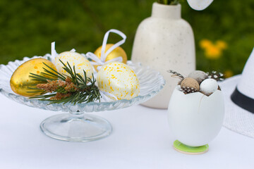 Rustic Easter, yellow Easter eggs on the table. The Bright Easter Holiday