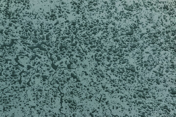 Accumulation of large water drops on a gray surface - Background