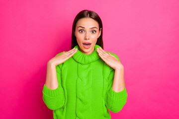 Portrait of astonished person scream wearing knitted pullover sweater isolated over fuchsia...