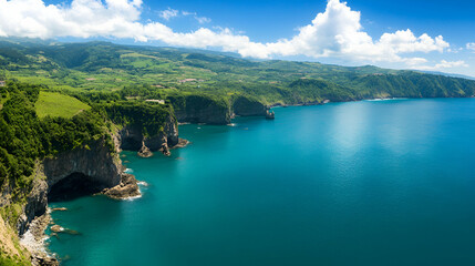 Obraz premium Coastal Cliffs & Azure Ocean, A Panoramic View of Lush Green Hills Meeting Turquoise Waters Under a Bright Sunny Sky