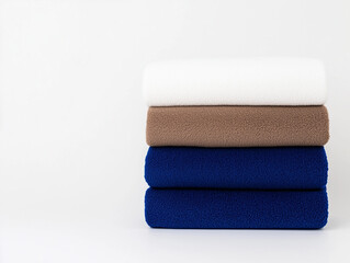 Bundled Fleece Blankets Mockup Tipped Modestly on White Background for Home and Bedding Designs