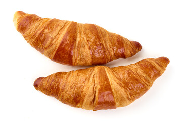 Two buttery croissants isolated on white background.