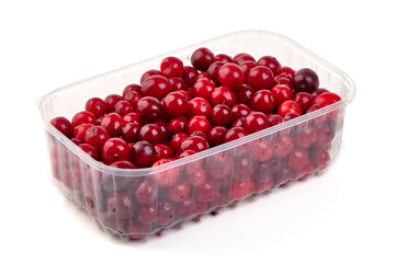 Fresh red cranberries isolated on white background.
