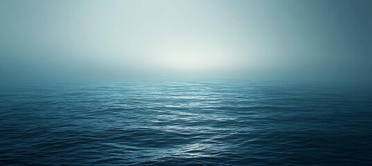 Obraz premium A gradient that starts with deep navy and fades into soft powder blue, like the calm of the ocean at night. 