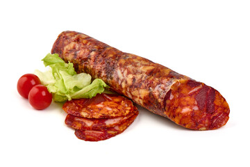 Spanish pork chorizo sausage slices, close-up, isolated on white background.