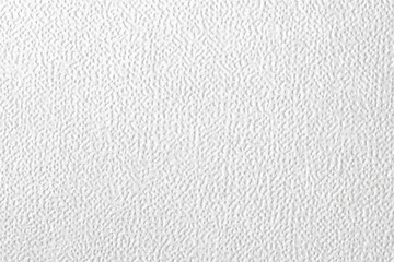 A close up of a white corrugated textured paper with delicate lines subtly visible throughout