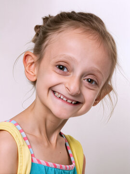 A young girl with progeria disease - big smile and playful expression poses happily indoors. She wears a vibrant outfit that reflects her cheerful personality - Generative AI