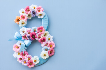 International Women's Day on March 8, Beautiful postcard banner for Women's Day, flowers in the shape of an eight