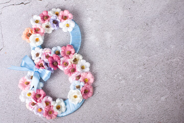 International Women's Day on March 8, Beautiful postcard banner for Women's Day, flowers in the shape of an eight