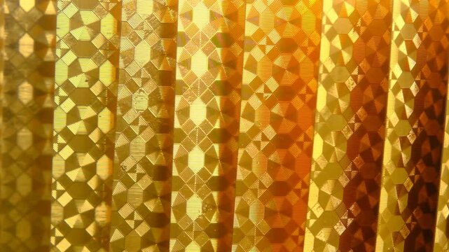 golden playing cards background, back view