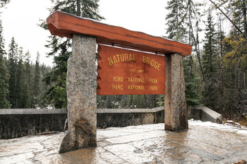Natural Bridge sign in Yoho National Park, Alberta, Canada in winter