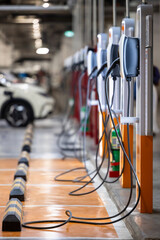 EV charger and electric car, Electric car charger station for charge ev battery, Plug for vehicle...