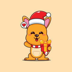 Cute kangaroo holding christmas candy and gift.