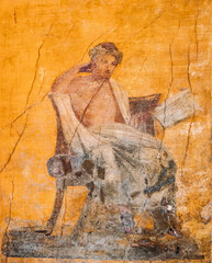 Pompeii, Italy. Ancient Frescoes In Wall Of Old Building