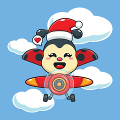 Cute ladybug wearing santa hat fly with plane in Christmas day.