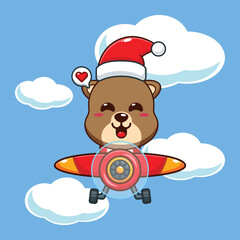 Cute otter wearing santa hat fly with plane.