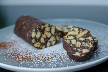 No bake chocolate salami - dessert of cookies, chocolate, butter and condensed milk