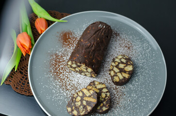 No bake chocolate salami - dessert of cookies, chocolate, butter and condensed milk
